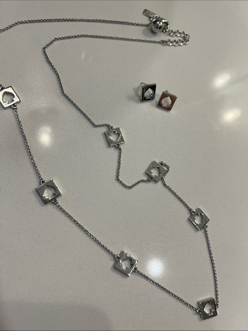 Kate Spade Silver Cutout Necklace and Stud Earrings Set